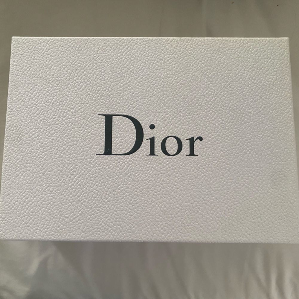 Dior holiday gift box, with tissue paper and ribbon